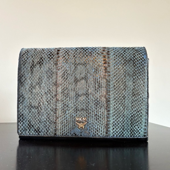 MCM Snakeskin & Leather Crossbody Bag can be worn as clutch or shoulder bag